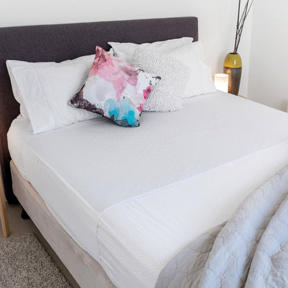 Conni X-wide Reusable Bed Pad with Tuck-ins